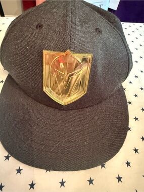 New Era Charcoal Snapback with golden knights Emblem